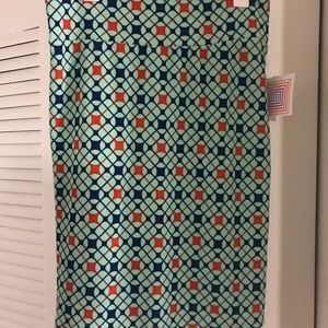 Turquoise LuluRoe Cassie NWT with red and black. L